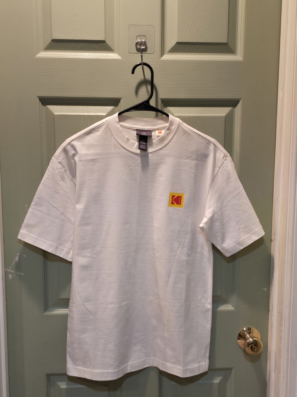 H&M White Short Sleeve Tee with Small Yellow & Red Logo